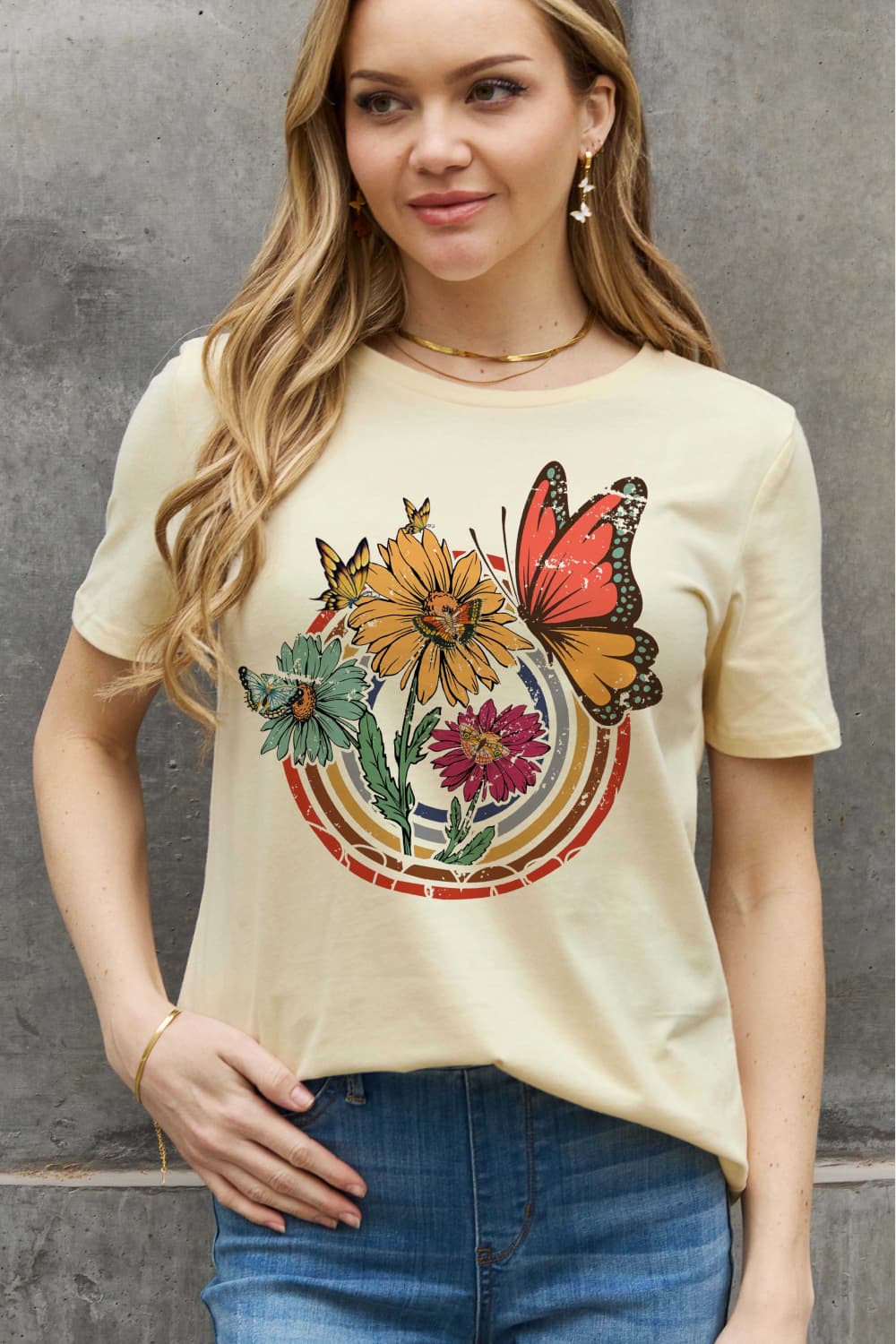 Simply Love Full Size Flower & Butterfly Graphic Cotton Tee featuring a vibrant floral and butterfly design on a casual round neck tee.