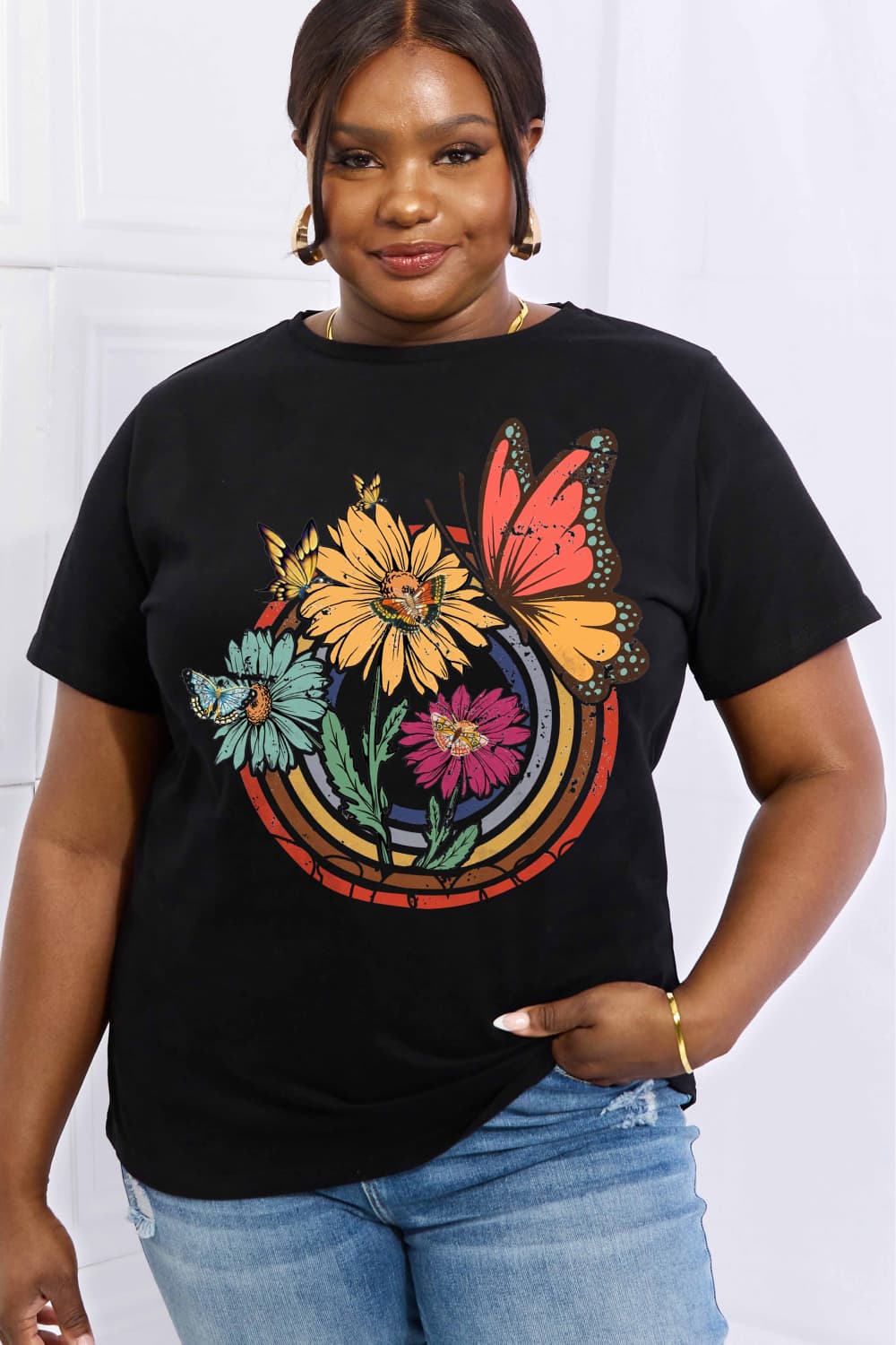 Simply Love Full Size Flower & Butterfly Graphic Cotton Tee featuring a vibrant floral and butterfly design on a casual round neck tee.
