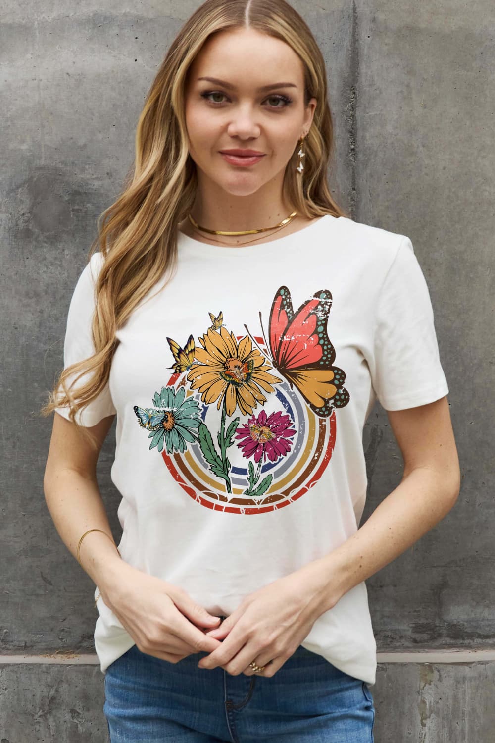Simply Love Full Size Flower & Butterfly Graphic Cotton Tee featuring a vibrant floral and butterfly design on a casual round neck tee.