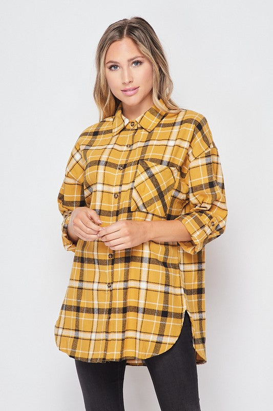 A stylish Single Pocket Button-up Plaid Flannel Shirt featuring a checkered pattern, roll-up long sleeves, and a relaxed fit.