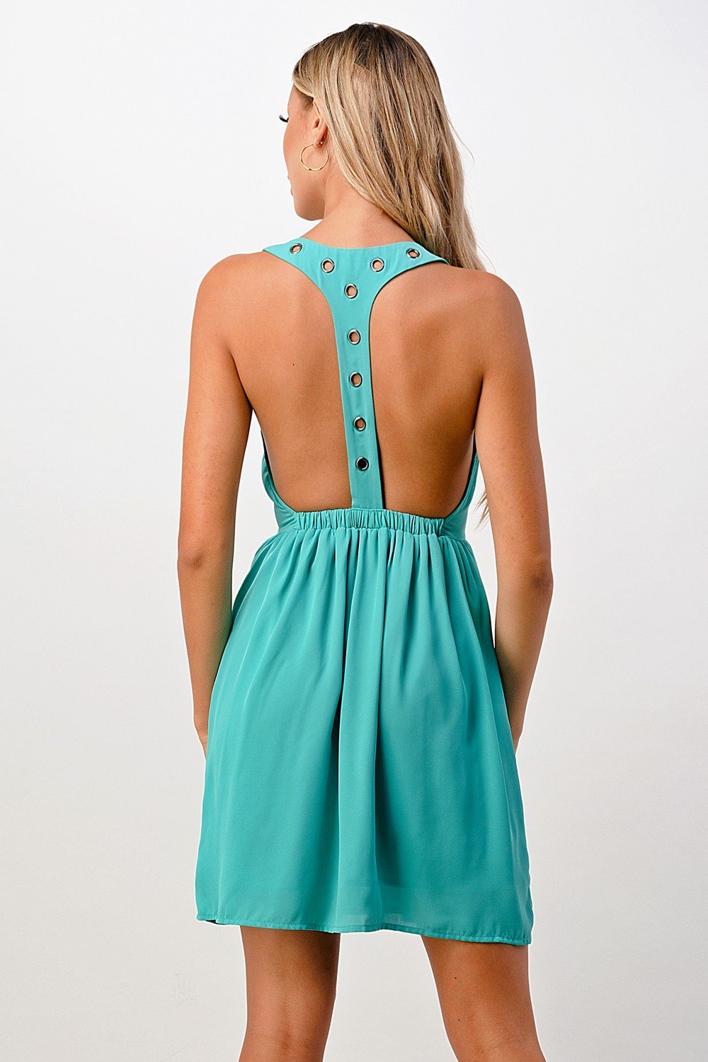 A stylish sleeveless A-line dress featuring grommet details, perfect for various occasions.