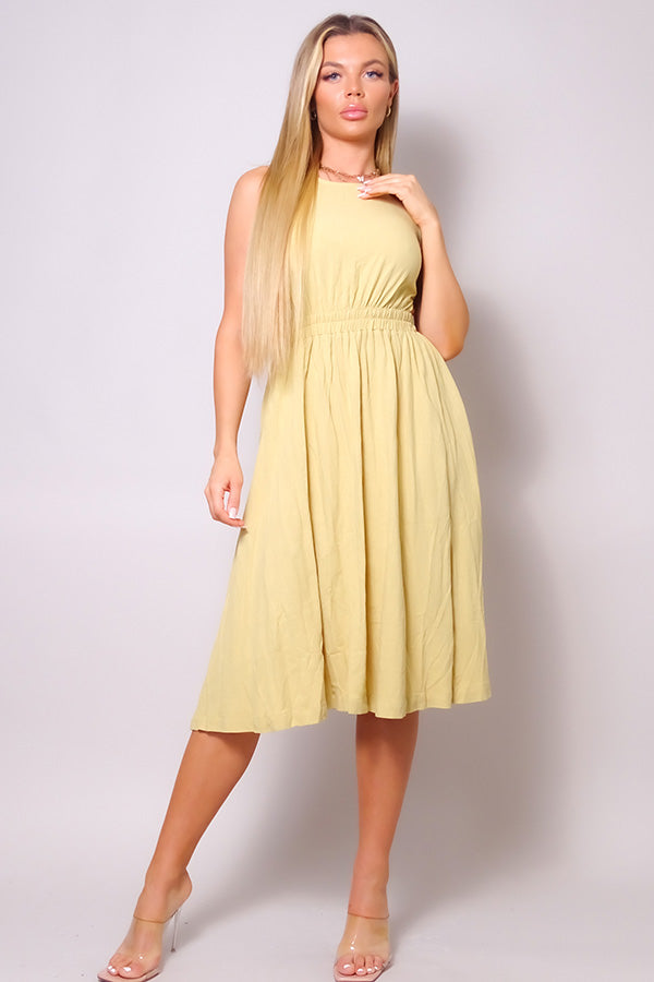 A stylish sleeveless back cutout linen midi dress in vibrant canary color, featuring a round neckline and flared skirt.