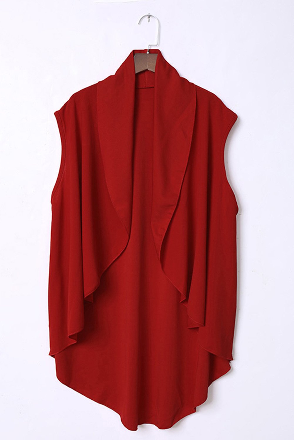 A stylish sleeveless cascade open front draped cardigan with a shawl neckline, showcasing a high-low hemline, perfect for layering.