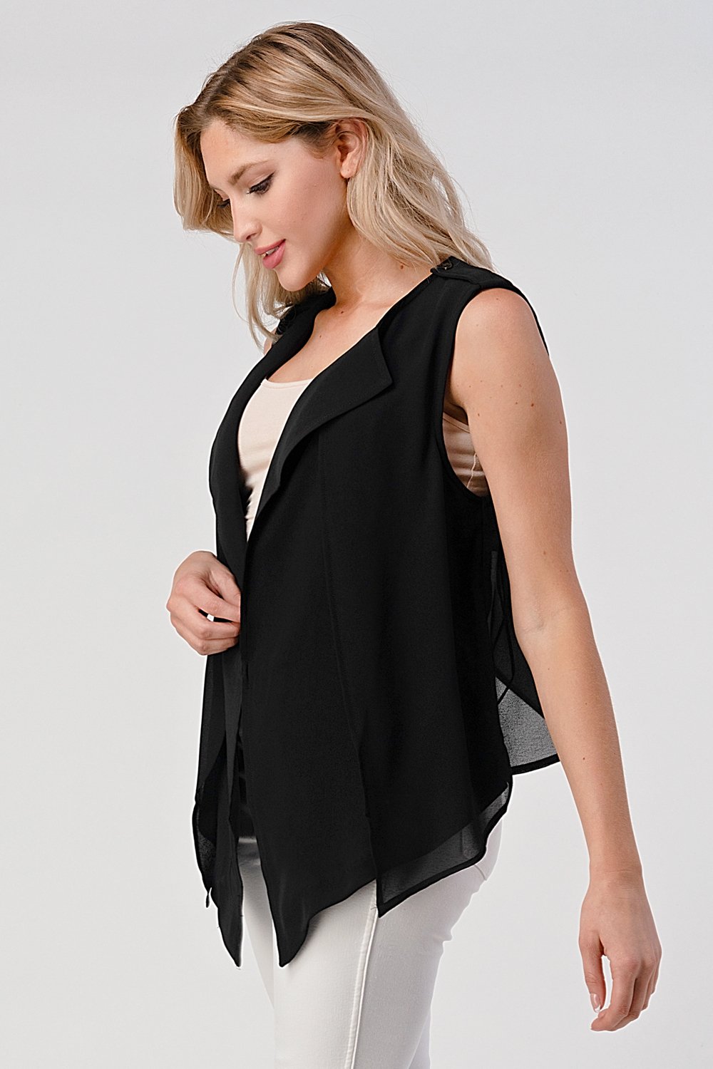 A stylish sleeveless draped open front vest with a high-low hem, perfect for layering over various outfits.