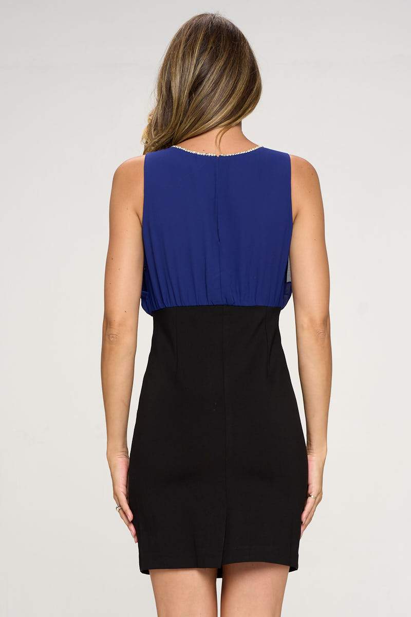 A stylish high waisted dress featuring a rhinestoned neckline, perfect for special occasions.