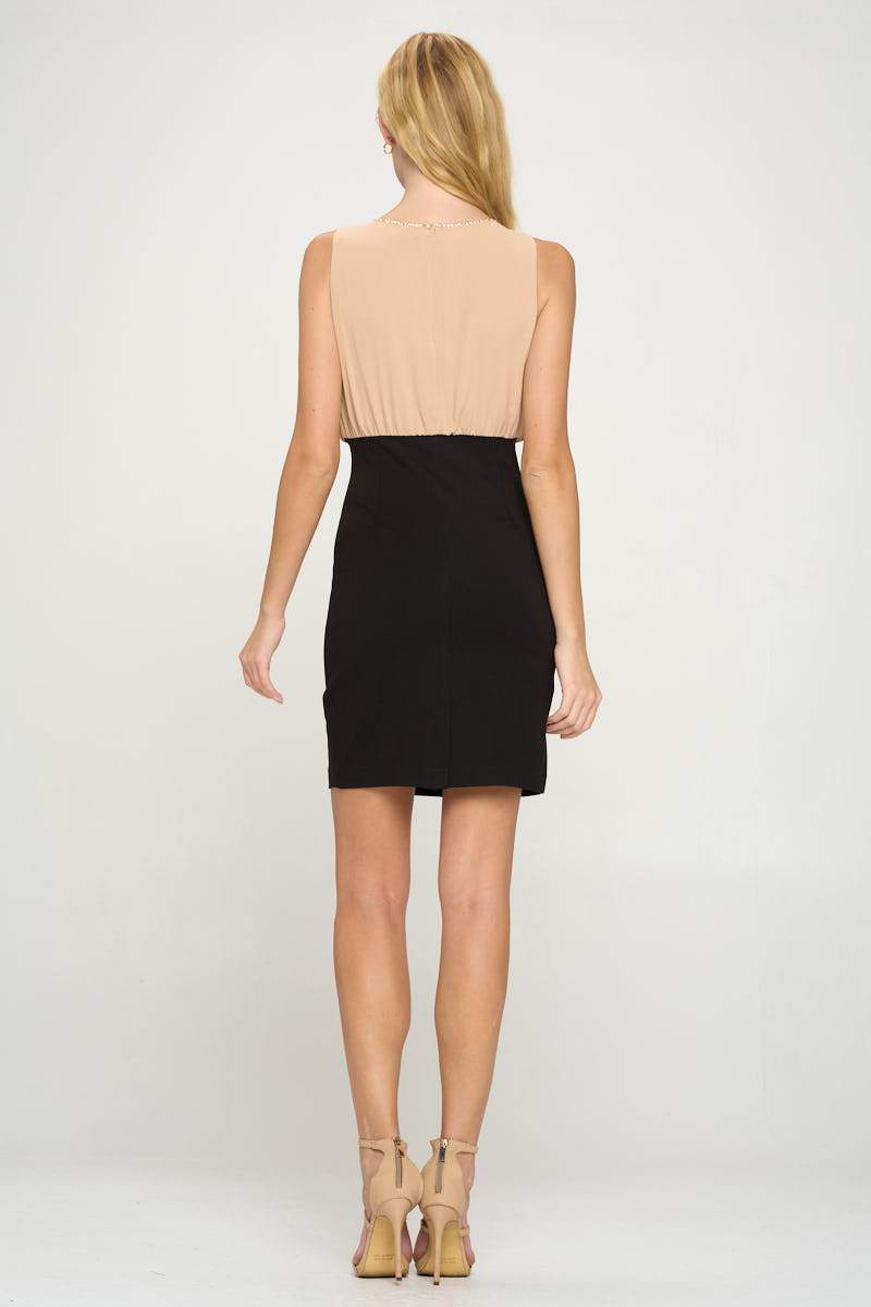A stylish high waisted dress featuring a rhinestoned neckline, perfect for special occasions.