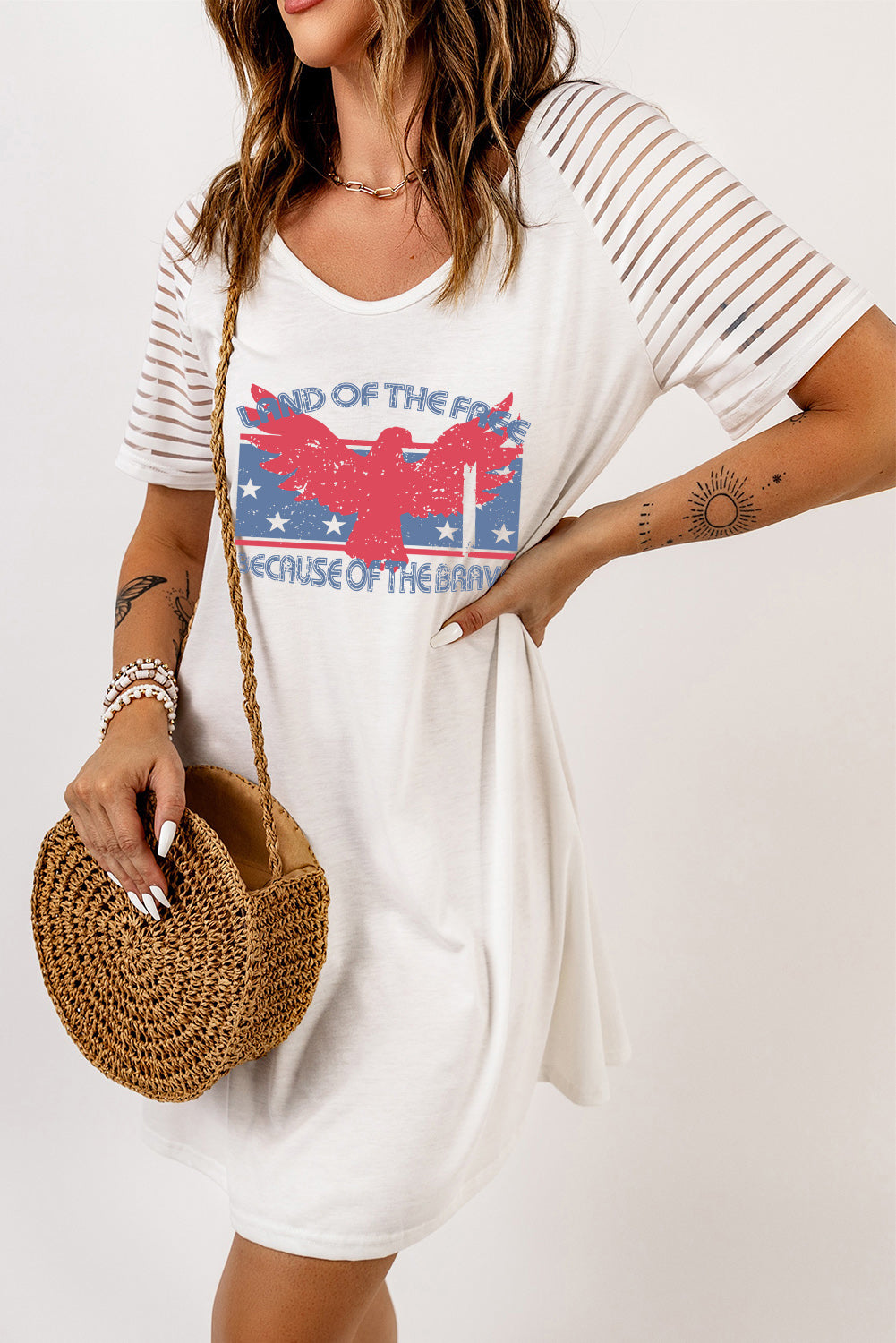 Slogan Graphic Sheer Striped Sleeve Tee Dress featuring a trendy graphic design, round neck, and short raglan sleeves in a mini length.