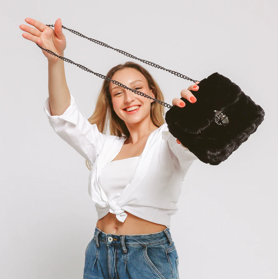 Elegant small black faux leather bag ART2275, showcasing its stylish design and high-quality synthetic leather material.