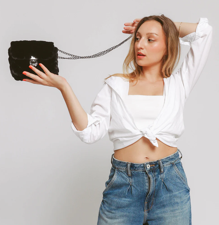 Elegant small black faux leather bag ART2275, showcasing its stylish design and high-quality synthetic leather material.