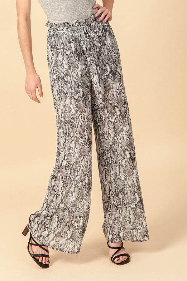 Stylish snake print wide leg pants with a waist tie, showcasing a trendy design and comfortable fit.