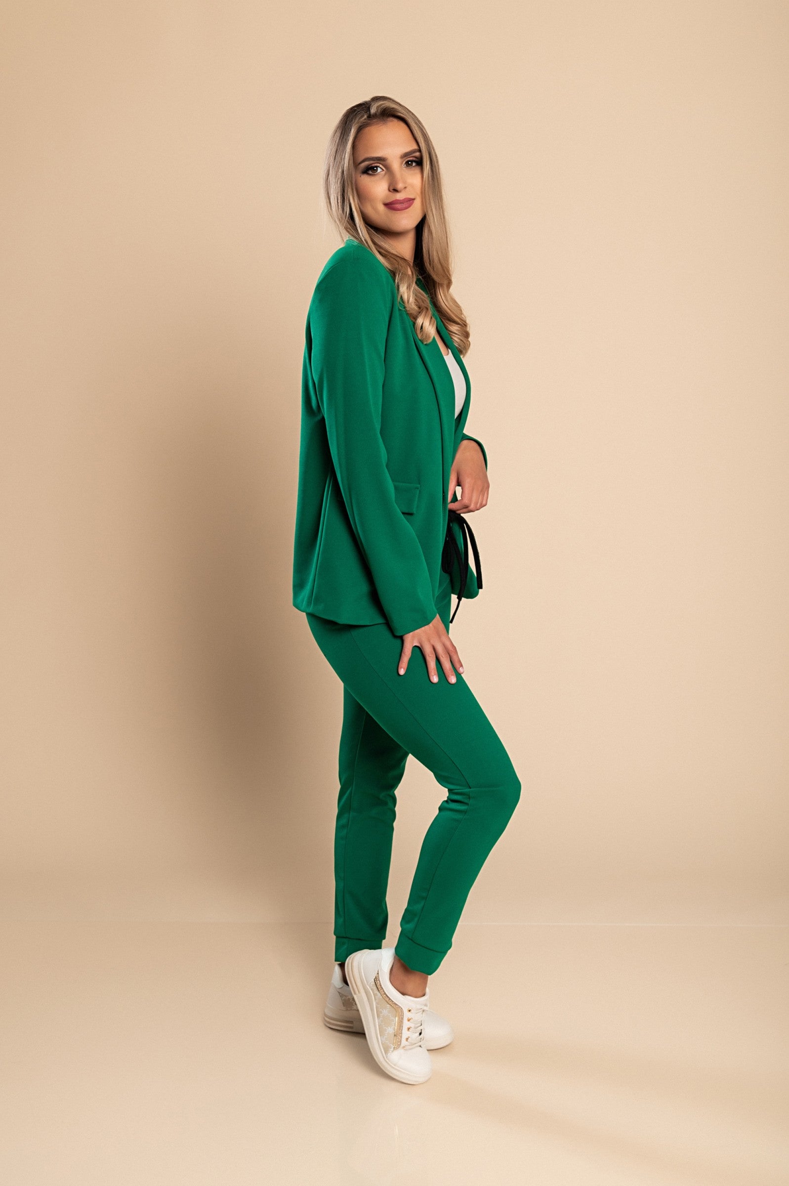 Light green elegant blazer and trousers set Estrena, featuring long sleeves, classic collar, and slim fit trousers with drawstring waist.