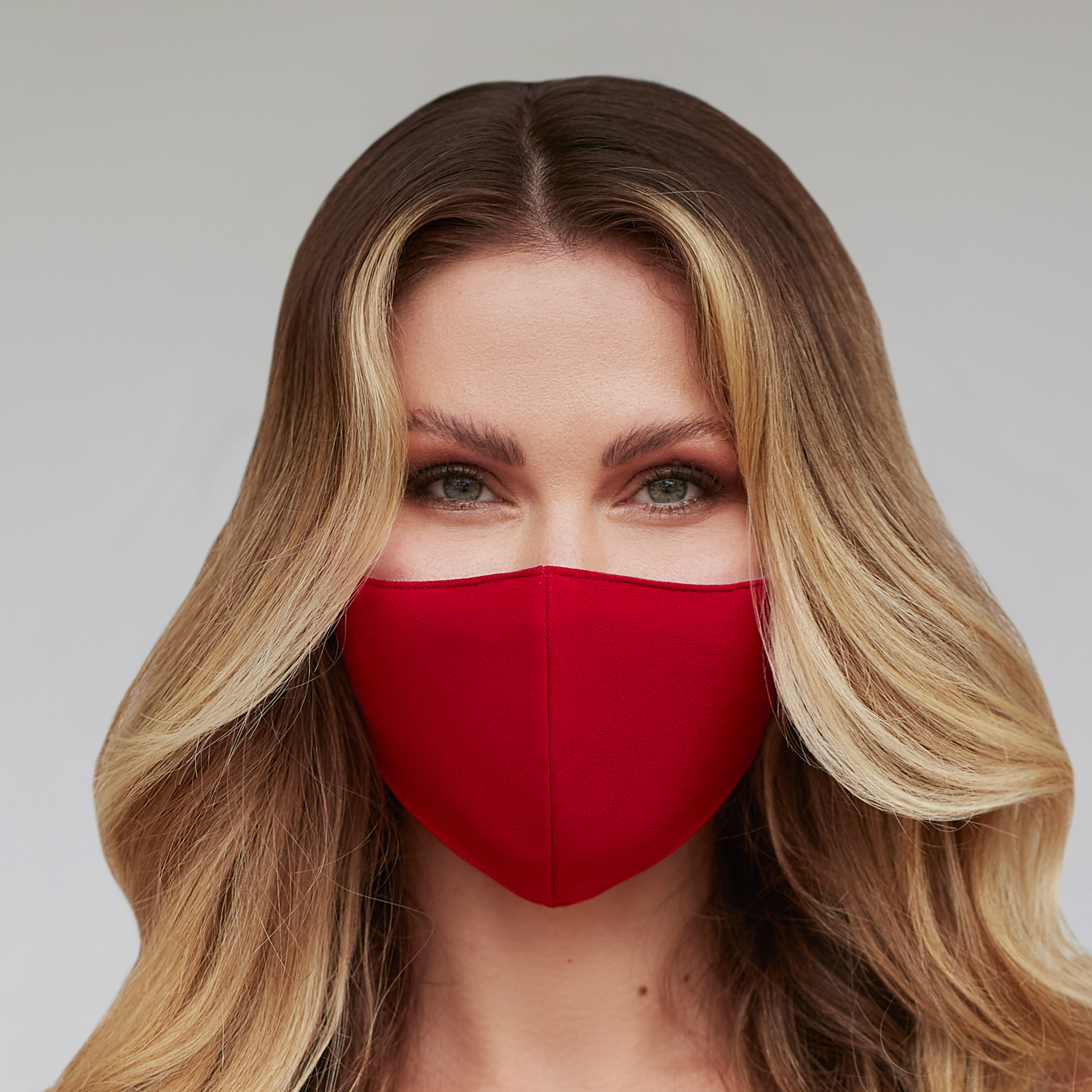 Solid deep red face mask, machine washable and reusable, showcasing a unique design for personal expression.