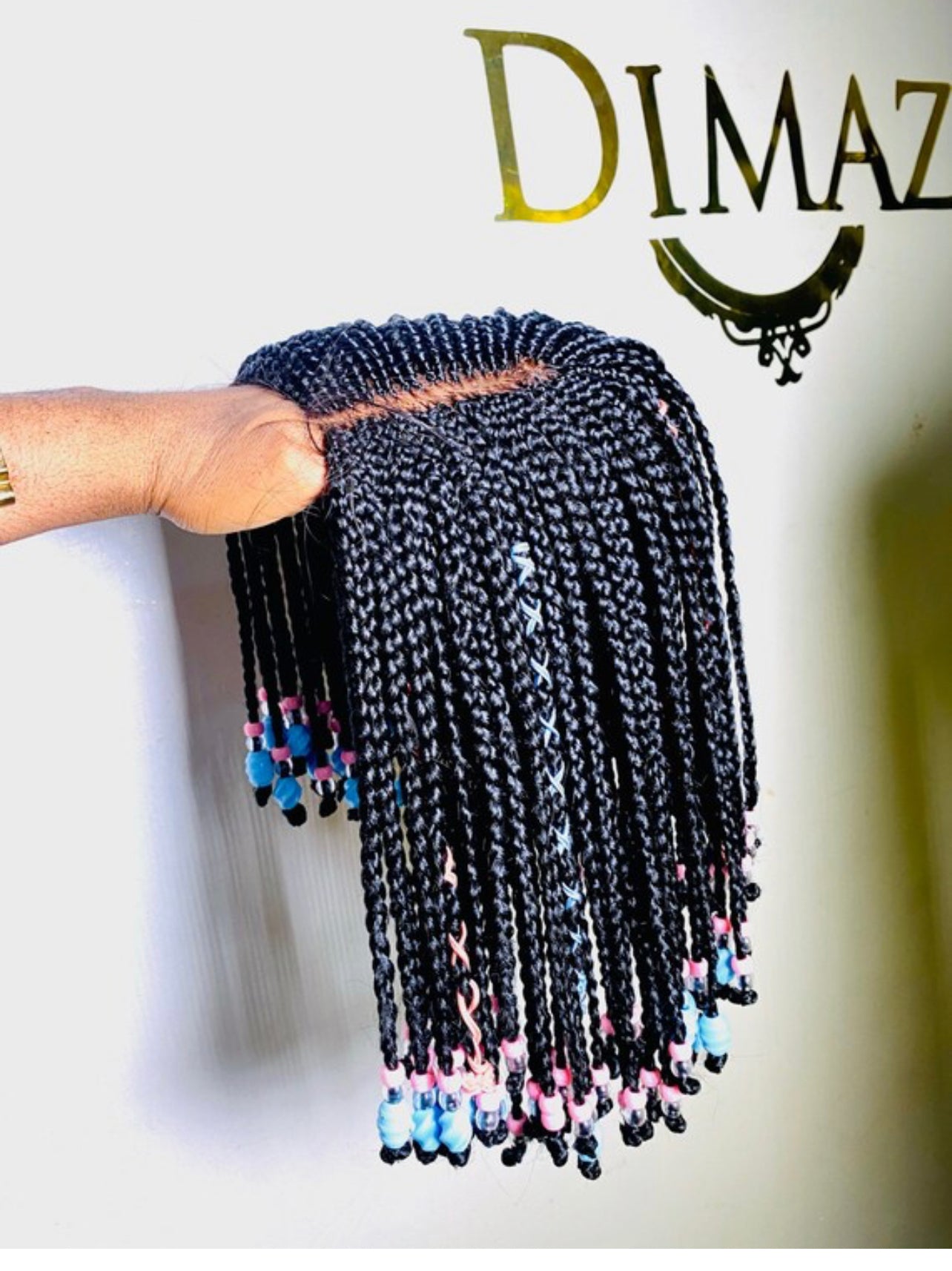 Sophia Wig - a beautifully braided wig for girls and teens, showcasing customizable hair colors and accessories.