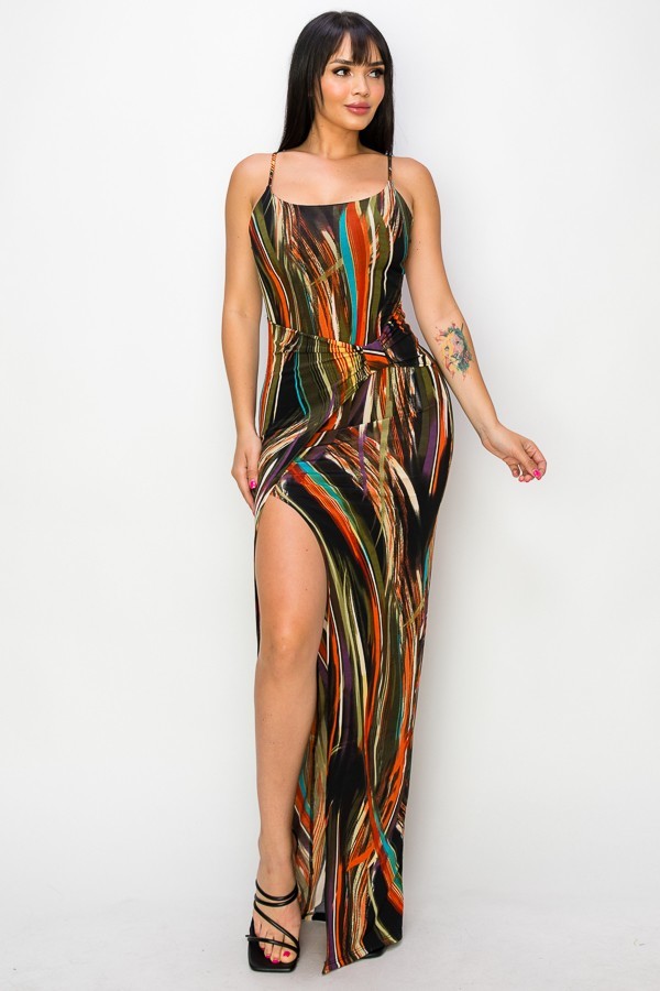 A beautiful multicolor long dress featuring spaghetti straps and a daring split thigh design, perfect for stylish summer outings.