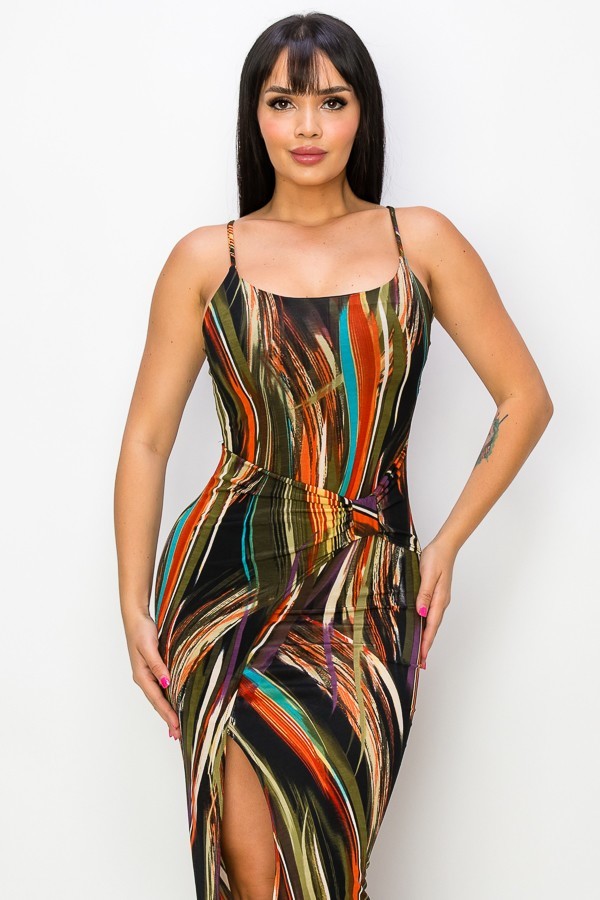 A beautiful multicolor long dress featuring spaghetti straps and a daring split thigh design, perfect for stylish summer outings.