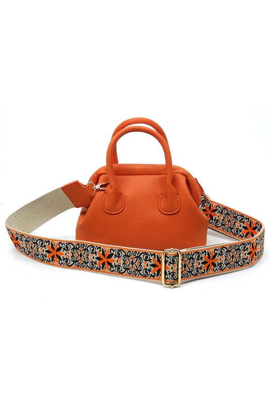 Spring Frame Doctors Satchel Crossbody Bag featuring a vintage design, faux vegan leather, and a detachable guitar strap.