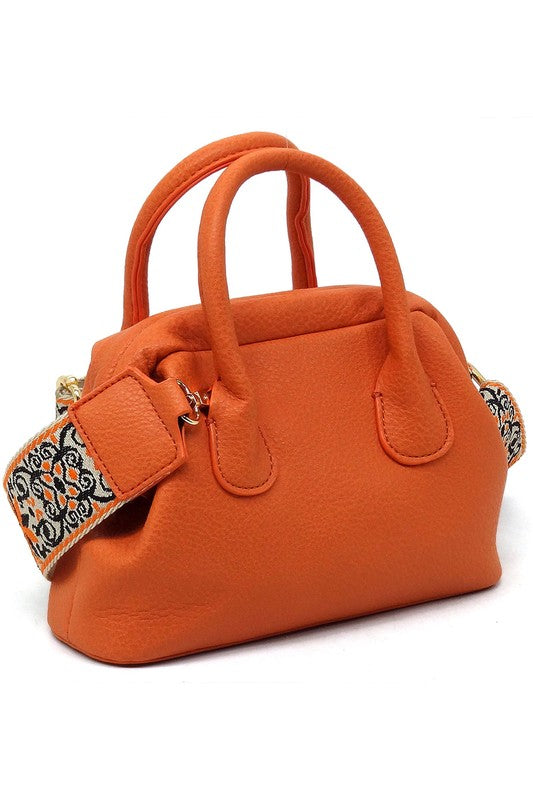 Spring Frame Doctors Satchel Crossbody Bag featuring a vintage design, faux vegan leather, and a detachable guitar strap.