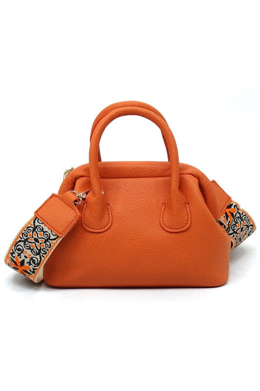 Spring Frame Doctors Satchel Crossbody Bag featuring a vintage design, faux vegan leather, and a detachable guitar strap.