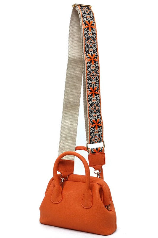 Spring Frame Doctors Satchel Crossbody Bag featuring a vintage design, faux vegan leather, and a detachable guitar strap.