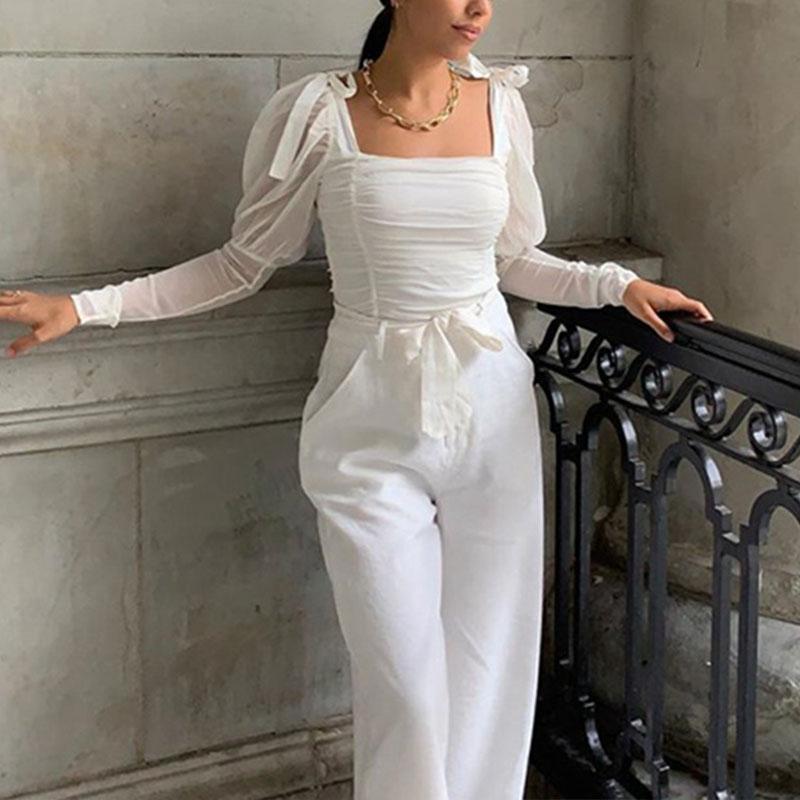 Elegant white blouse with square collar and puff sleeves, featuring a stylish bow, perfect for women's fashion.