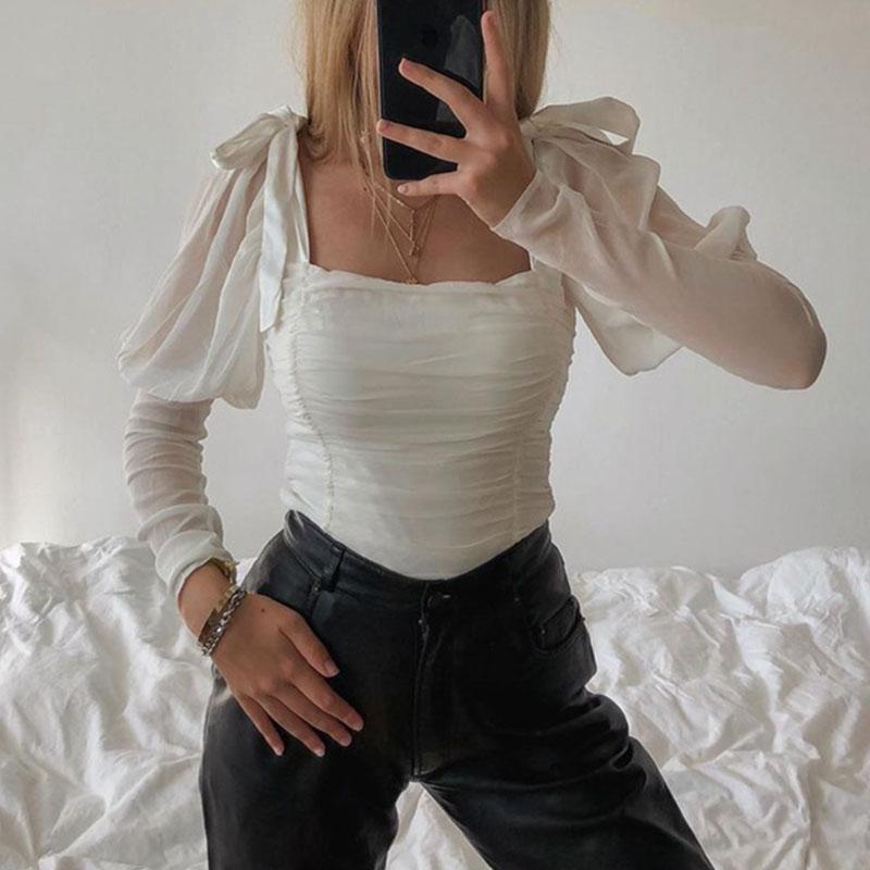 Elegant white blouse with square collar and puff sleeves, featuring a stylish bow, perfect for women's fashion.