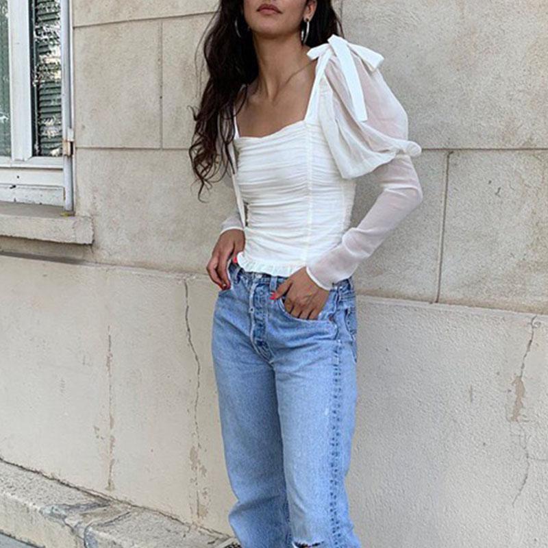 Elegant white blouse with square collar and puff sleeves, featuring a stylish bow, perfect for women's fashion.