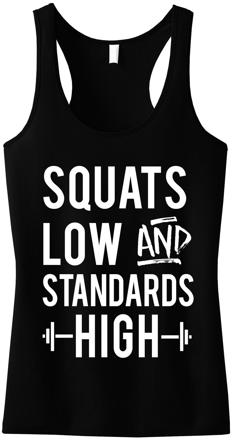 Black racerback tank top with 'SQUATS LOW AND STANDARDS HIGH' slogan, designed for workouts.