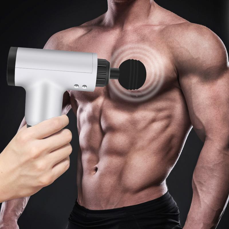 Stock Massage Gun with multiple massage heads for muscle relaxation and recovery.