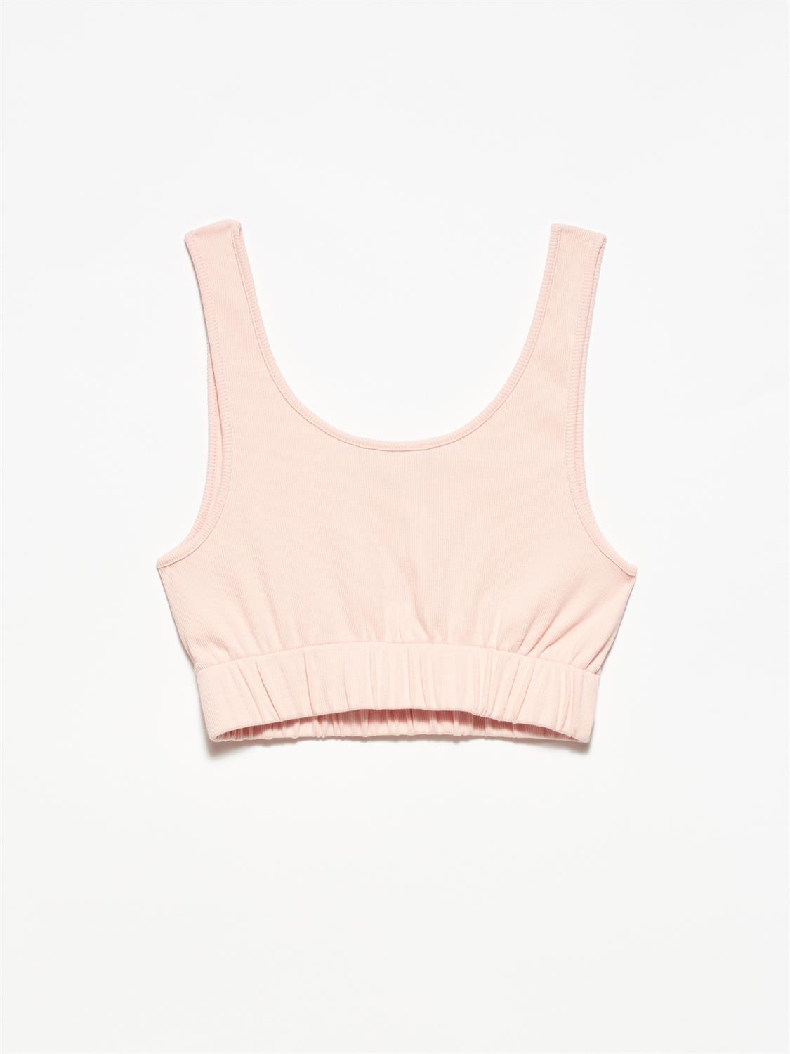 A stylish strappy top made from 96% cotton and 4% elastane, featuring thin straps and a comfortable fit.