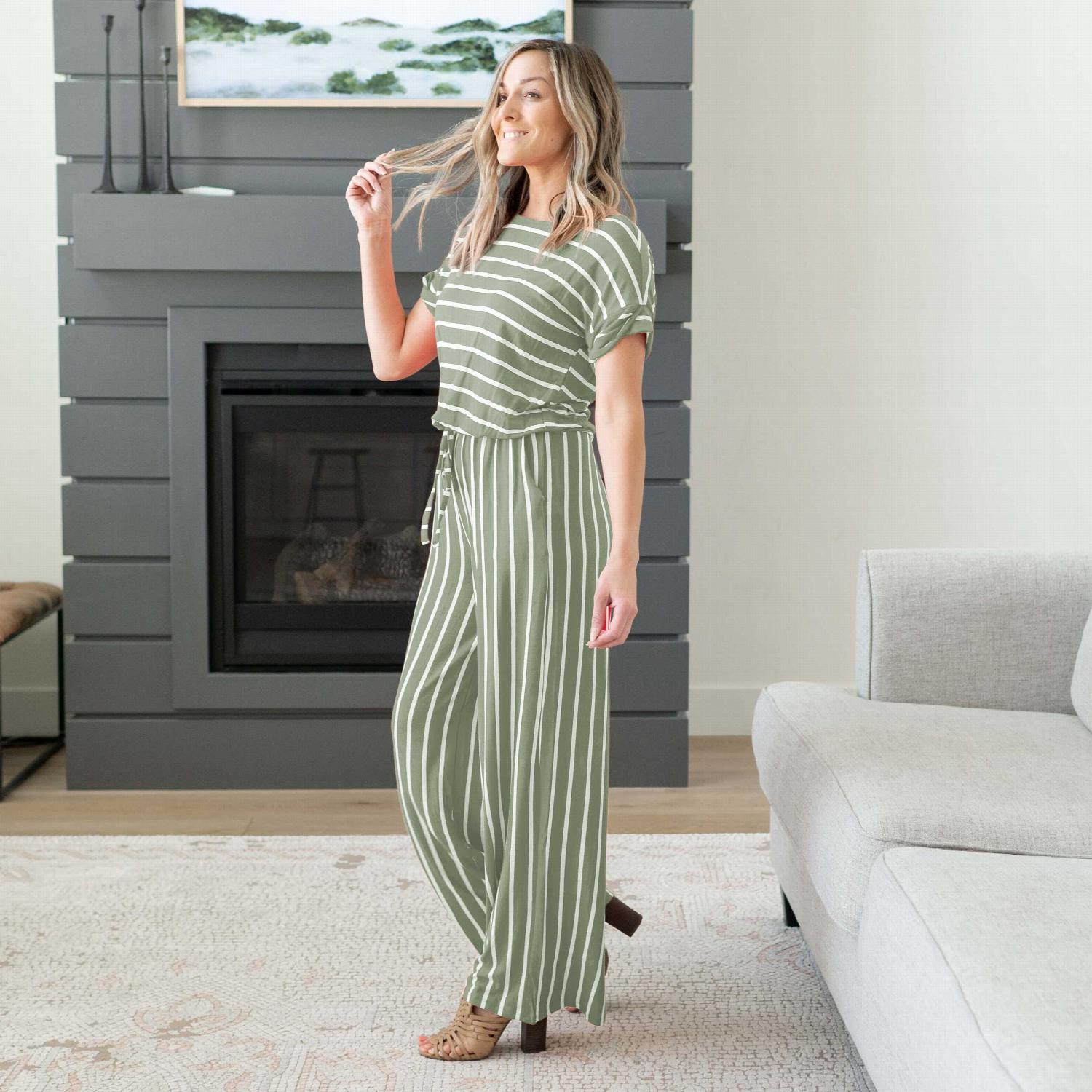 A stylish Stripe Jumpsuit featuring an elastic waist and back keyhole detail, perfect for casual outings and lounging.