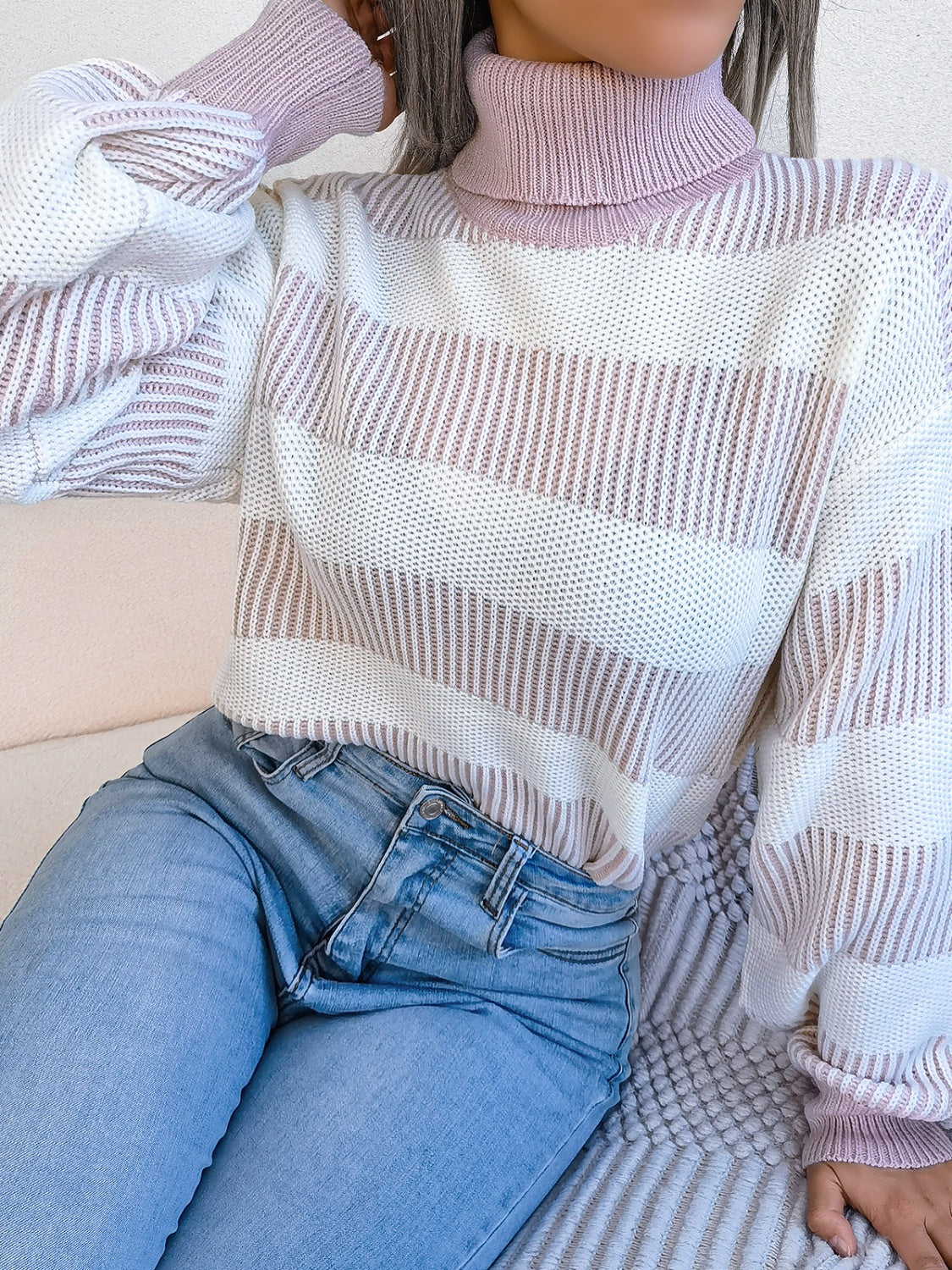 A cozy striped turtleneck long sleeve sweater in soft acrylic fabric, showcasing its stylish design and comfortable fit.