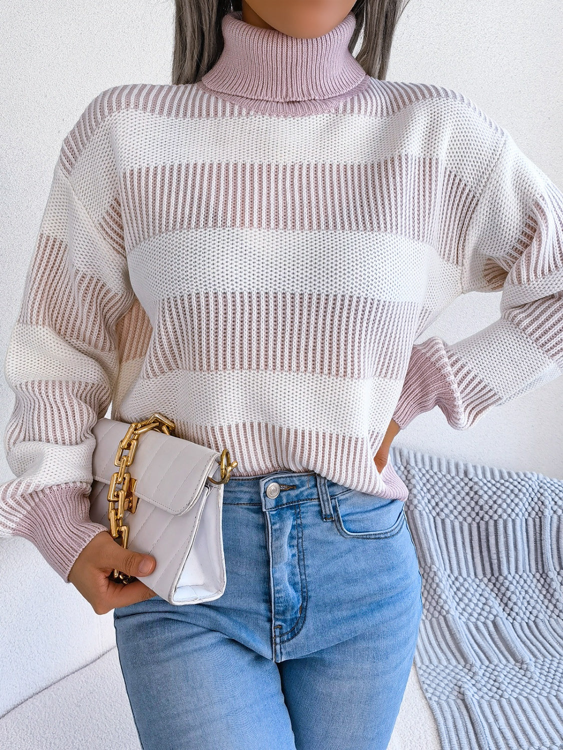 A cozy striped turtleneck long sleeve sweater in soft acrylic fabric, showcasing its stylish design and comfortable fit.