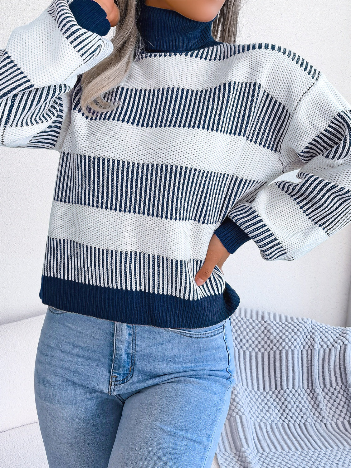 A cozy striped turtleneck long sleeve sweater in soft acrylic fabric, showcasing its stylish design and comfortable fit.