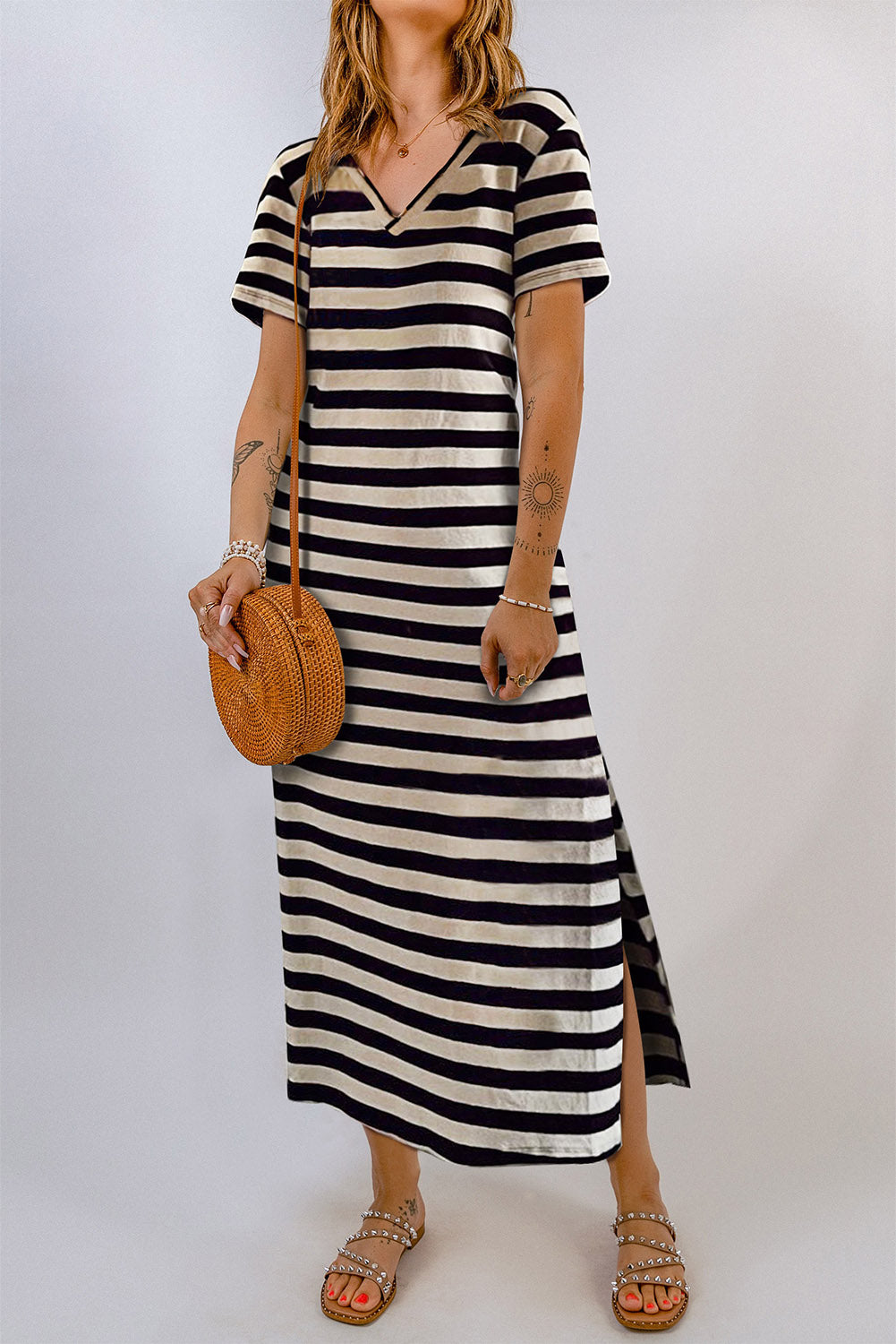 A stylish striped V-neck short sleeve dress with a side slit, perfect for casual outings.
