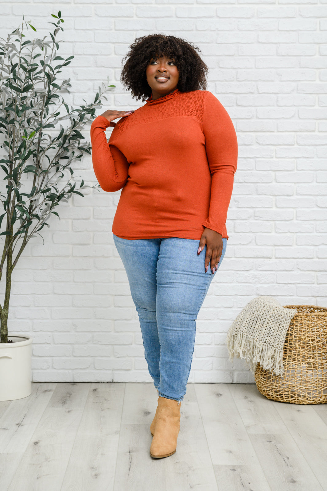 Stylin Girl Turtleneck in Rust featuring ruched neckline and fitted long sleeves, perfect for layering.