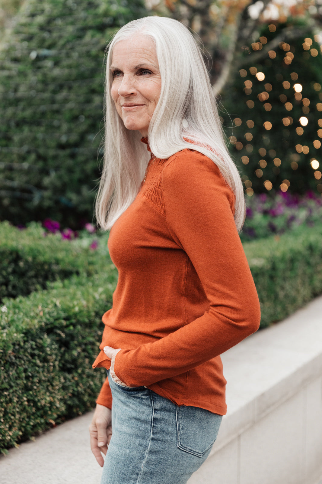 Stylin Girl Turtleneck in Rust featuring ruched neckline and fitted long sleeves, perfect for layering.