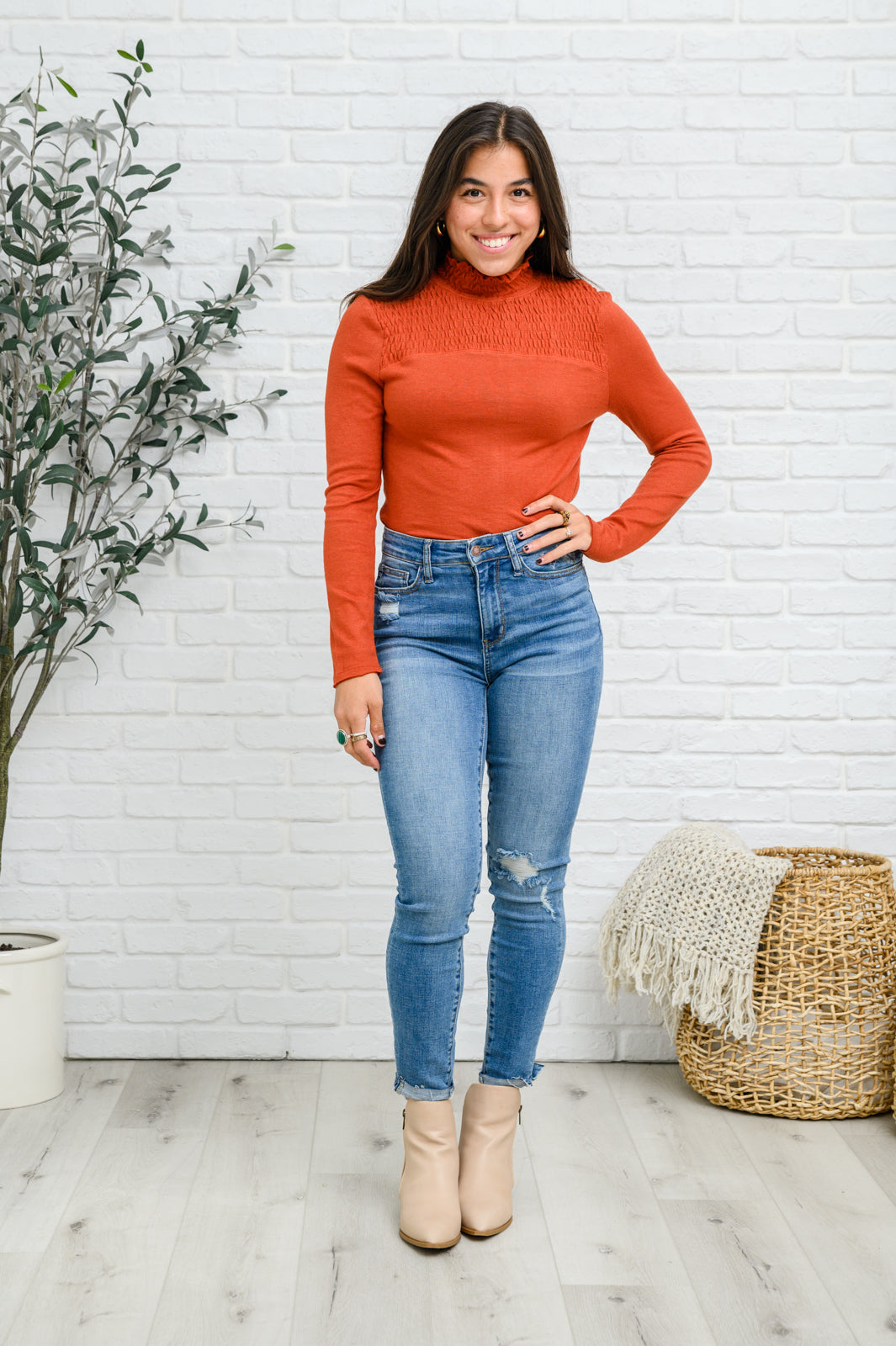 Stylin Girl Turtleneck in Rust featuring ruched neckline and fitted long sleeves, perfect for layering.