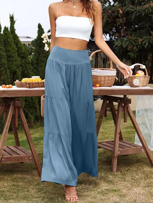 A pair of stylish summer casual wide leg trousers made from cotton and linen, featuring a high waist and loose fit, perfect for warm weather.