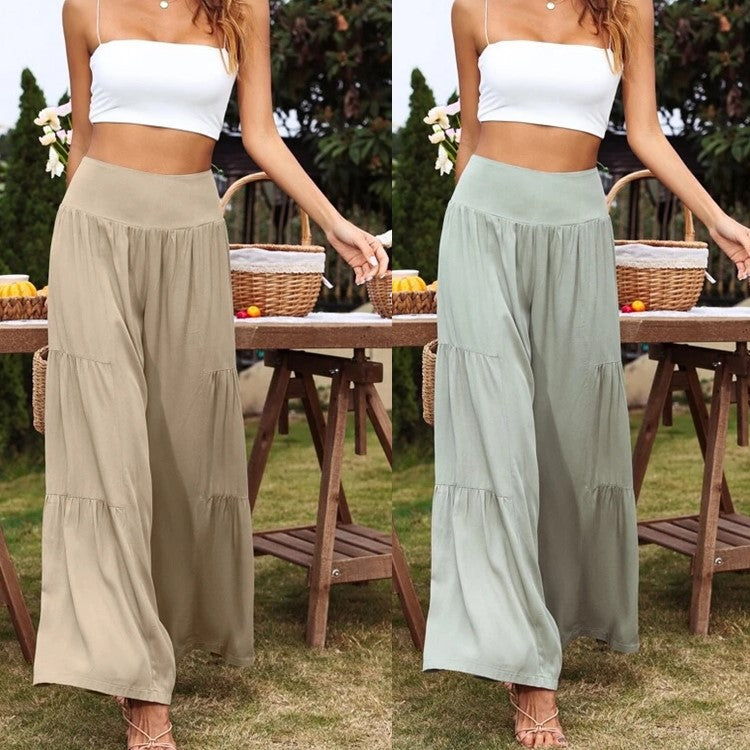 A pair of stylish summer casual wide leg trousers made from cotton and linen, featuring a high waist and loose fit, perfect for warm weather.