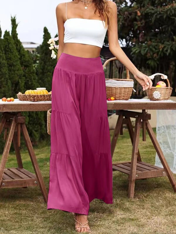 A pair of stylish summer casual wide leg trousers made from cotton and linen, featuring a high waist and loose fit, perfect for warm weather.