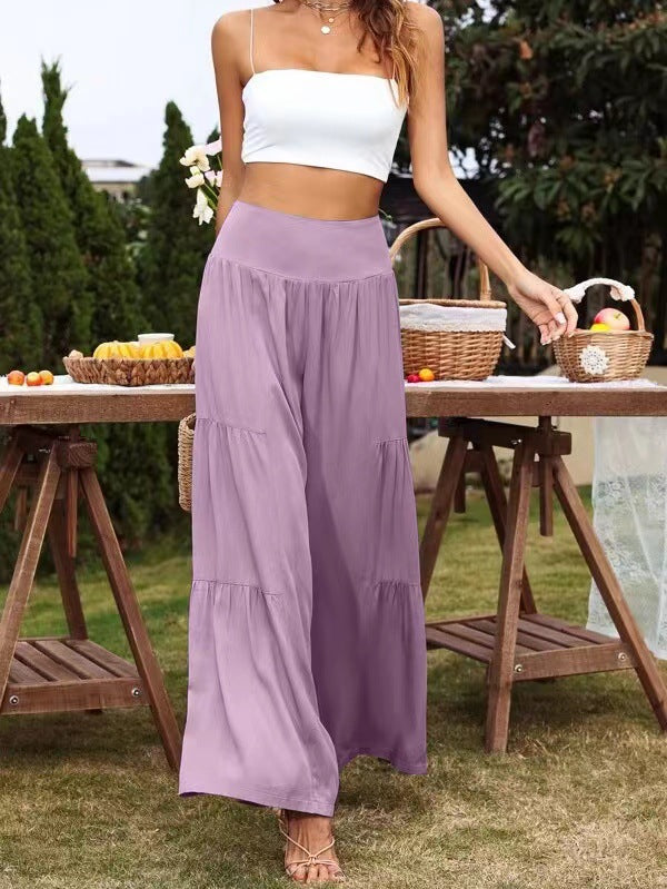 A pair of stylish summer casual wide leg trousers made from cotton and linen, featuring a high waist and loose fit, perfect for warm weather.