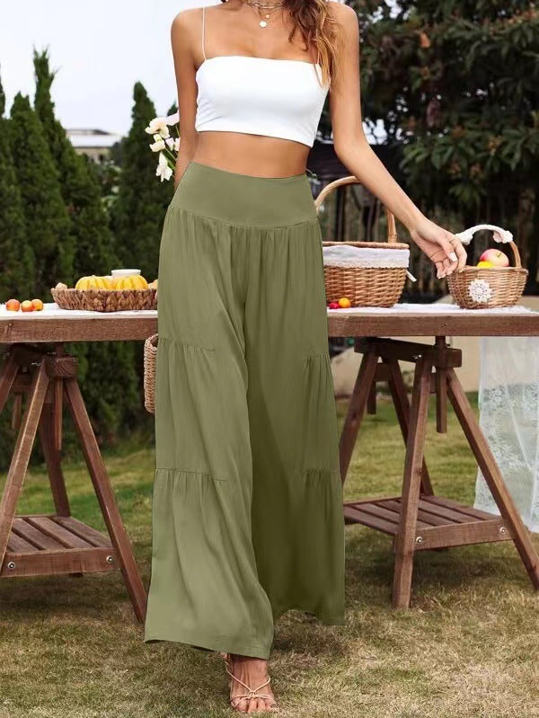 A pair of stylish summer casual wide leg trousers made from cotton and linen, featuring a high waist and loose fit, perfect for warm weather.