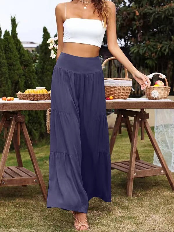 A pair of stylish summer casual wide leg trousers made from cotton and linen, featuring a high waist and loose fit, perfect for warm weather.