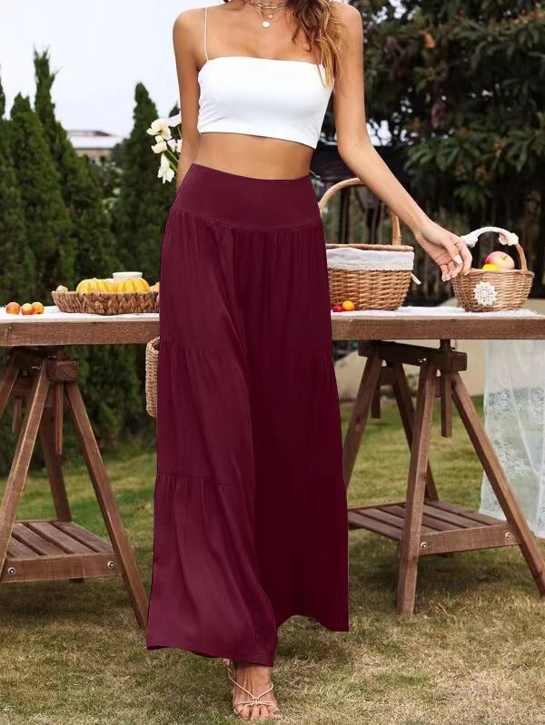 A pair of stylish summer casual wide leg trousers made from cotton and linen, featuring a high waist and loose fit, perfect for warm weather.