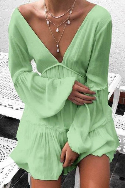 Summer mini dress Montserrat in mint color with gathered sleeves and pleated design, perfect for casual wear.