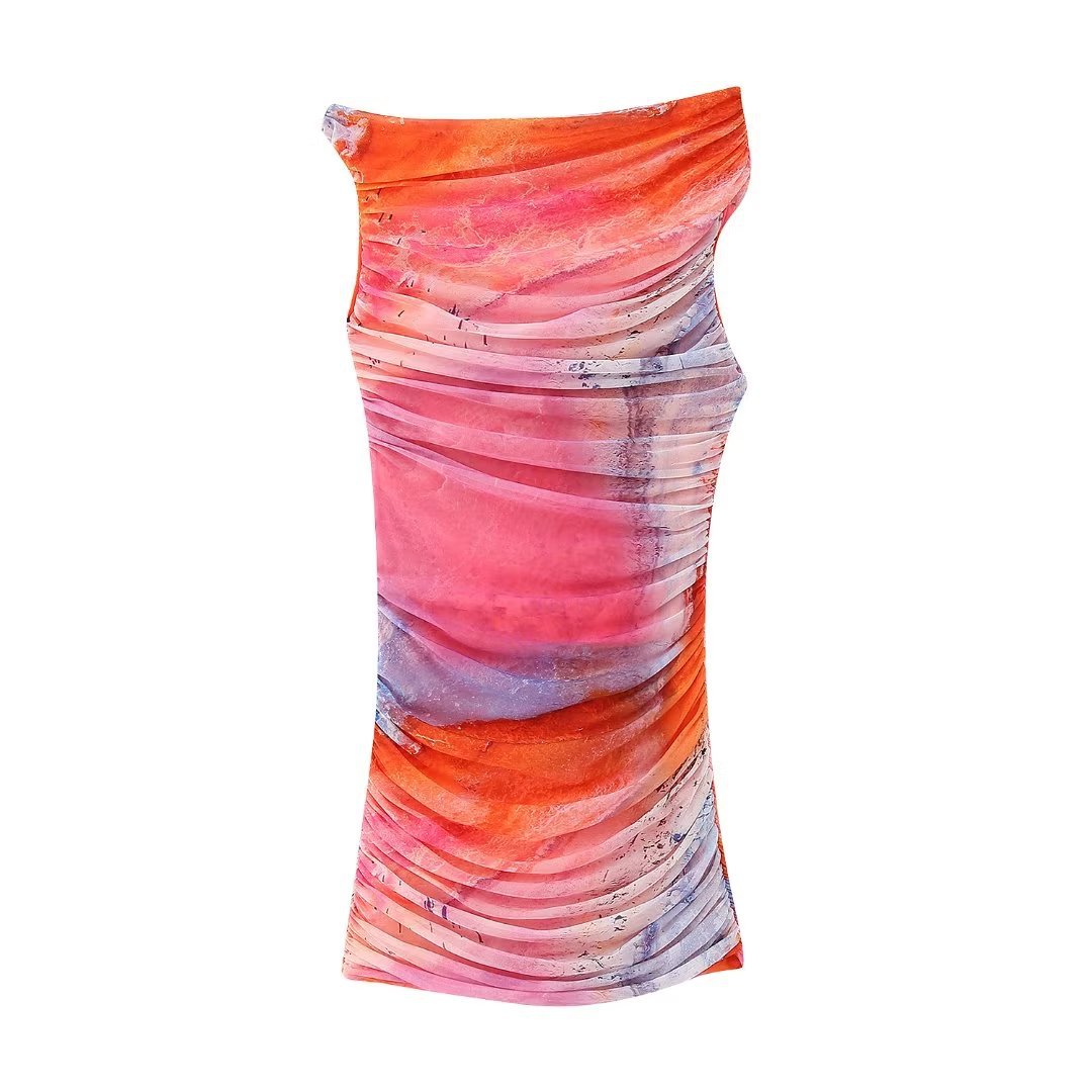 A stylish Summer Pleated Tulle Dress for women featuring an asymmetrical neckline and pleated design, perfect for beach outings.