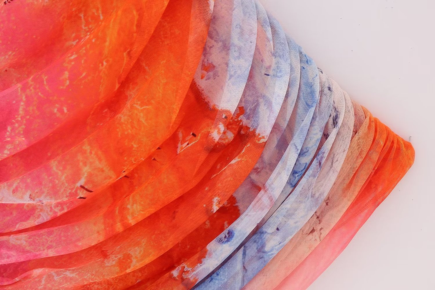 A stylish Summer Pleated Tulle Dress for women featuring an asymmetrical neckline and pleated design, perfect for beach outings.