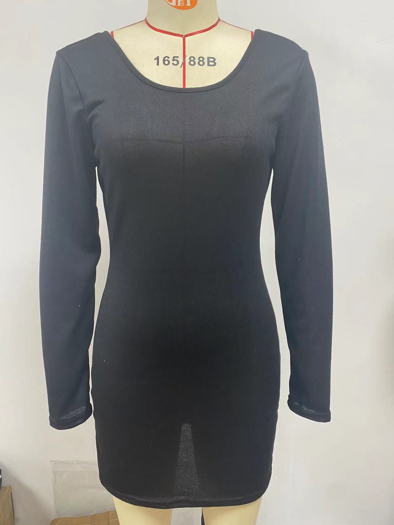 A stylish summer dress featuring a sexy open back design, solid color, and A-line skirt, perfect for warm weather occasions.