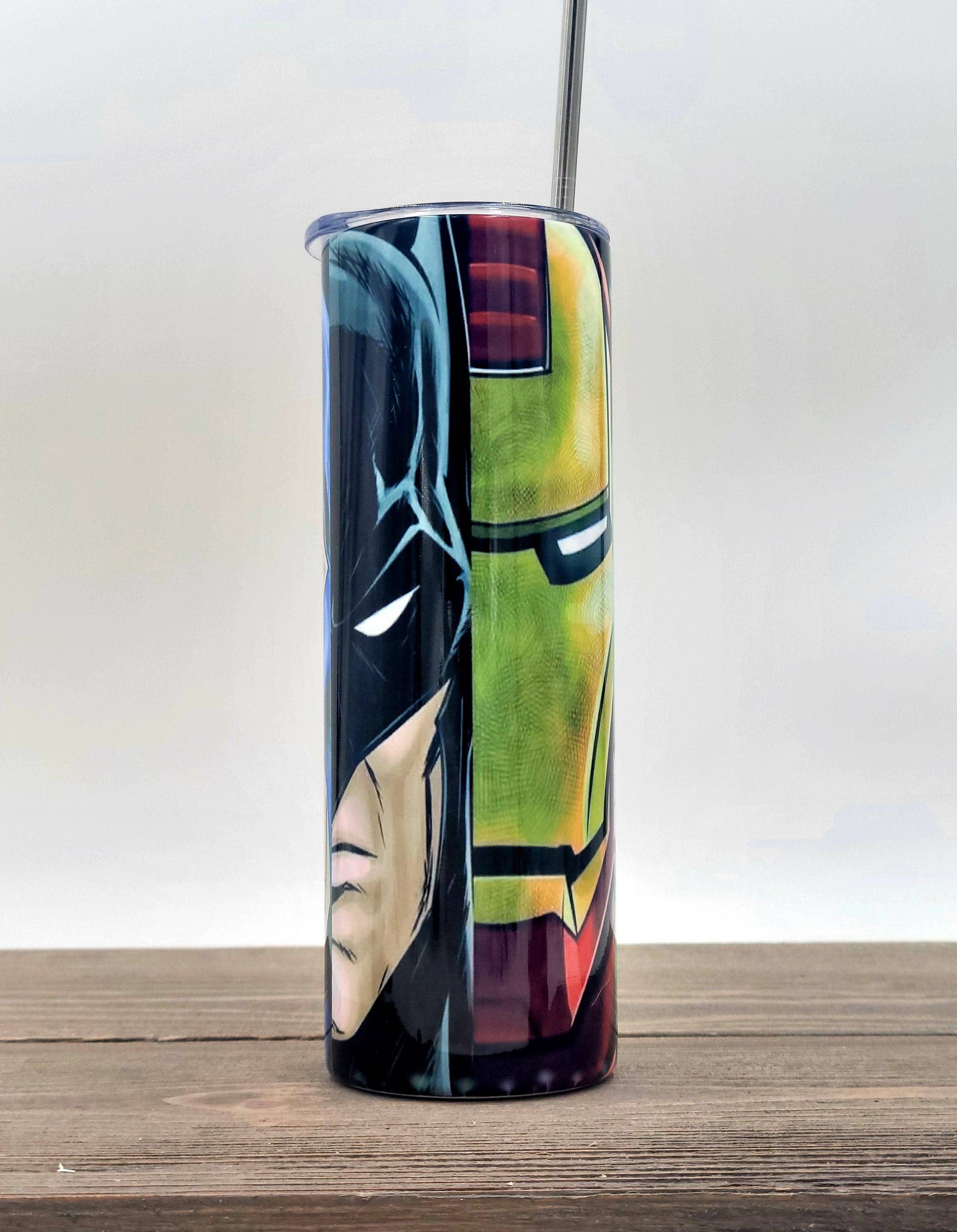 Super Hero Mash Up 20oz stainless steel tumbler with vibrant superhero design, insulated for hot and cold drinks.