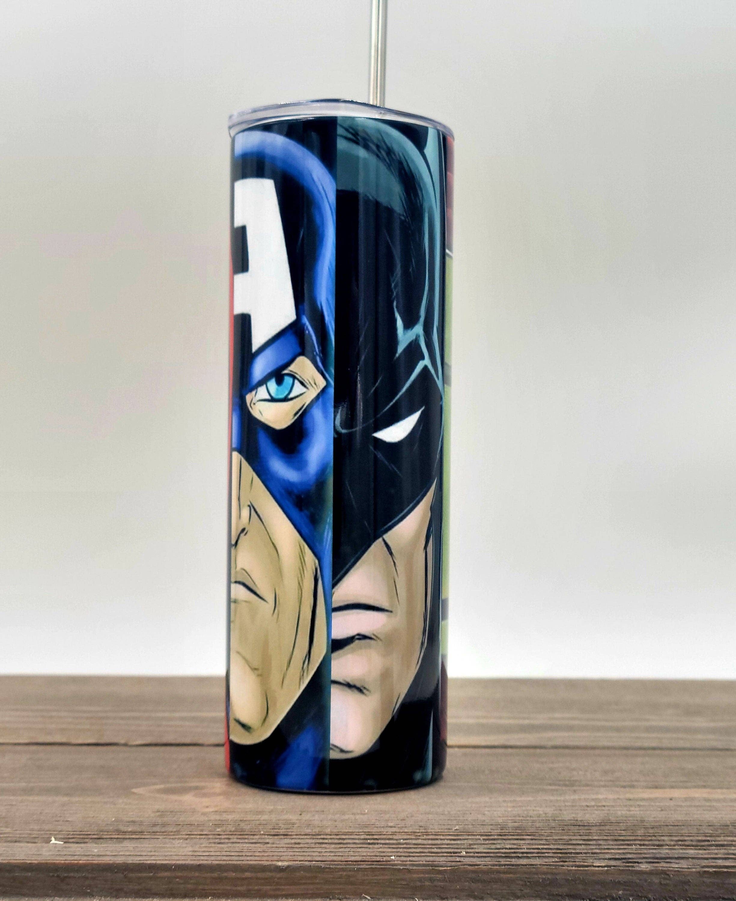 Super Hero Mash Up 20oz stainless steel tumbler with vibrant superhero design, insulated for hot and cold drinks.